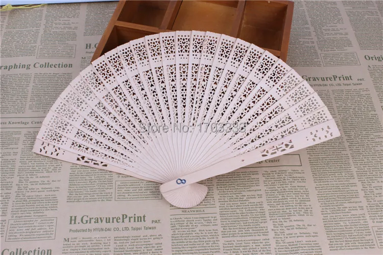 Image Wholesale Customized Hollow Out Sandalwood Folding Hand Fan Unique Wedding Favors And Gifts For Guests Free Shipping #DHX54