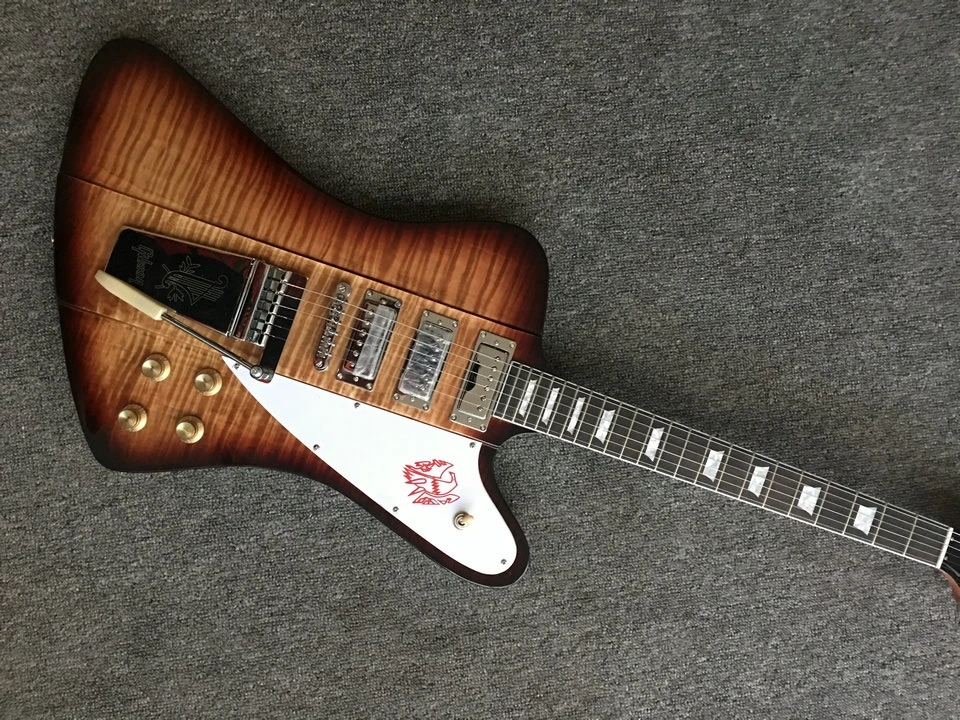 electric Guitar with Long Verson Maestro Vibrola firebird electric guitar Flamed Maple top free shipping
electric Guitar with Long Verson Maestro Vibrola firebird electric guitar Flamed Maple top free shipping