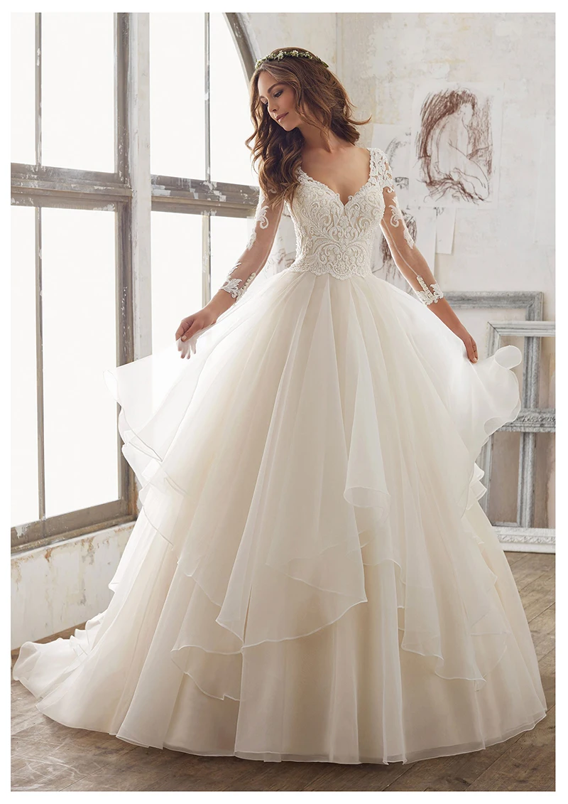 2019 Elegant Beach Bridal Gown A Line Wedding Dress Deep V-neck Long Sleeves Lace Applique Cheap Custom Size Mariage
2019 Elegant Beach Bridal Gown A Line Wedding Dress Deep V-neck Long Sleeves Lace Applique Cheap Custom Size Mariage