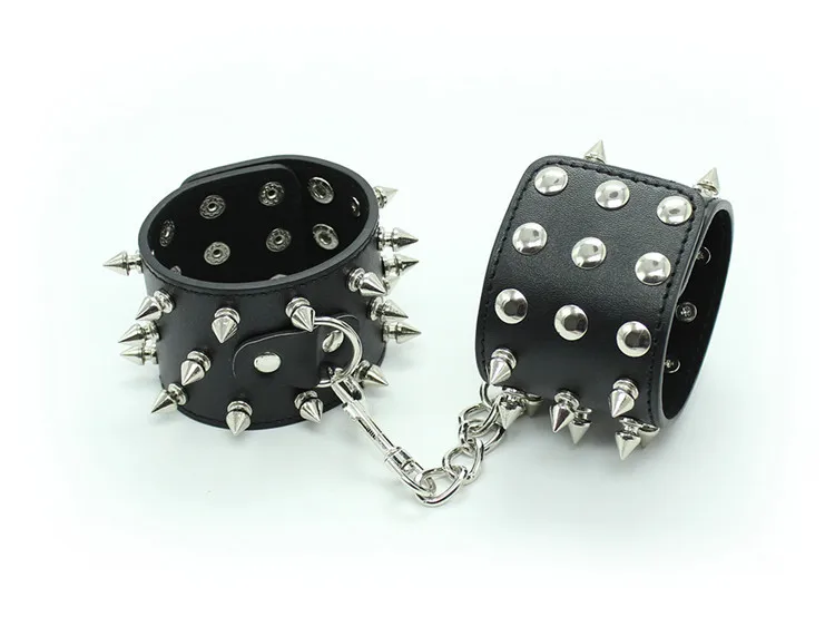 Unisex Fashion Black Metal Studded Spiked PU Leather Chained Wrist Cuffs Punk Hippie Fetish Arm Band Role Play Accessory
Unisex Fashion Black Metal Studded Spiked PU Leather Chained Wrist Cuffs Punk Hippie Fetish Arm Band Role Play Accessory