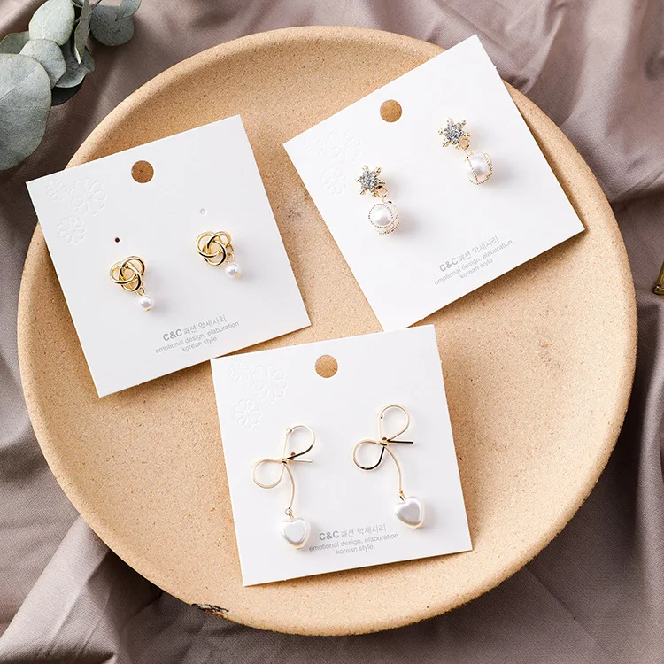 MENGJIQIAO 2019 New Japan Korean Snowflake Bow Simulated Pearl Stud Earrings For Women Fashion Jewelry Circle Knotted Oorbellen
MENGJIQIAO 2019 New Japan Korean Snowflake Bow Simulated Pearl Stud Earrings For Women Fashion Jewelry Circle Knotted Oorbellen