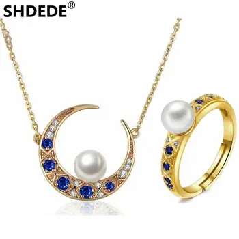 SHDEDE 925 Sterling Silver Moon shaped necklace Ring jewelry set natural fresh white pearl exotic fashion boutique jewelry
SHDEDE 925 Sterling Silver Moon shaped necklace Ring jewelry set natural fresh white pearl exotic fashion boutique jewelry