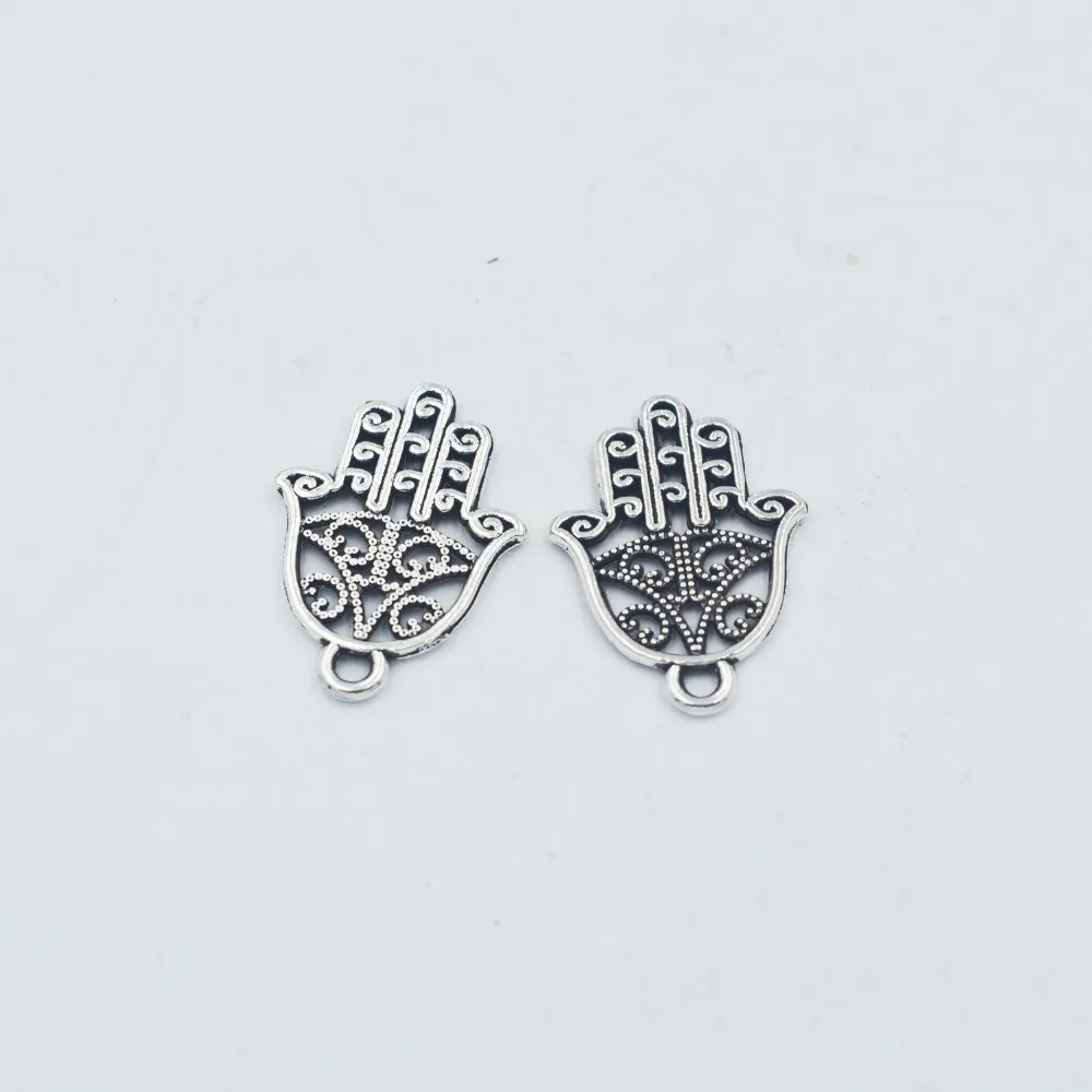 

Hot sell 85pcs zinc alloy metal antique silver tone charms double side hand charms pendant for jewelry findings