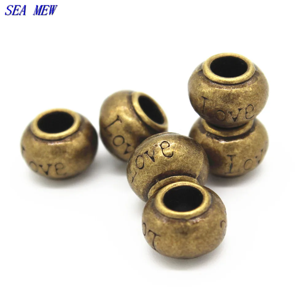 SEA MEW 11*8MM Antique Bronze Plated Hole Beads Vintage Style Alloy "Love" Word Carved Beads For Jewelry Making
SEA MEW 11*8MM Antique Bronze Plated Hole Beads Vintage Style Alloy "Love" Word Carved Beads For Jewelry Making