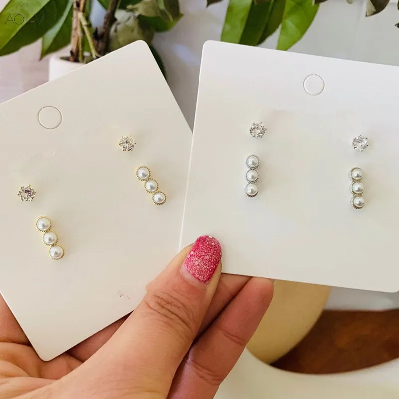 AOMU 2019 New Simple Sweet Pearl Crystal Rhinestone Irregular Stud Earrings for Women Girl Party Wedding Gift Jewelry Brincos
AOMU 2019 New Simple Sweet Pearl Crystal Rhinestone Irregular Stud Earrings for Women Girl Party Wedding Gift Jewelry Brincos