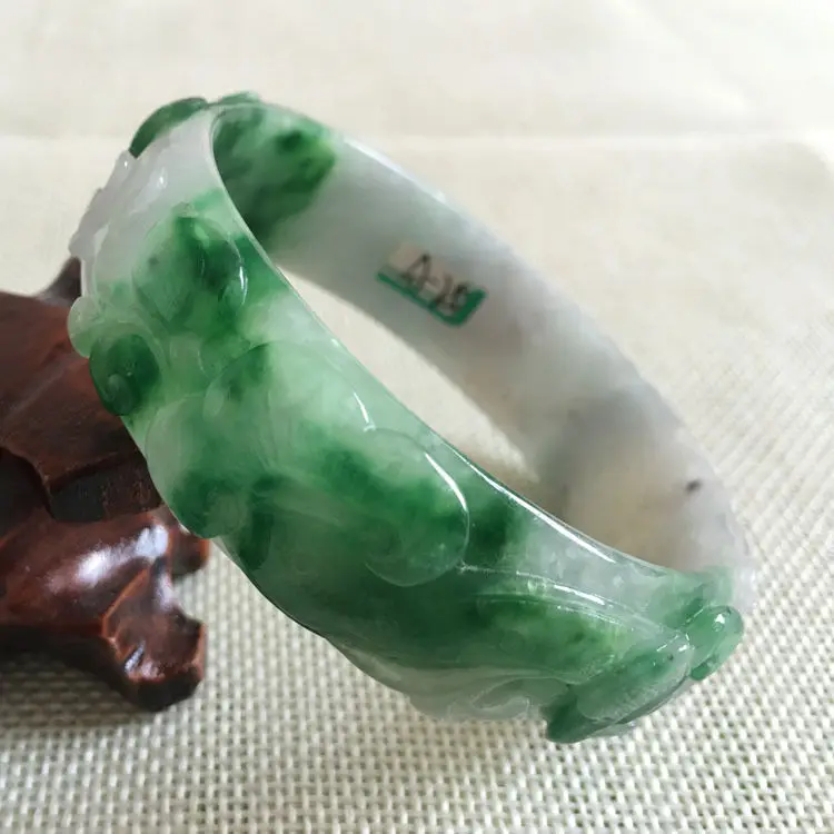 A-251 Beautiful Hand-carved Emerald Green Jadeite Jade Gems Bracelet Bangle 60mm
A-251 Beautiful Hand-carved Emerald Green Jadeite Jade Gems Bracelet Bangle 60mm