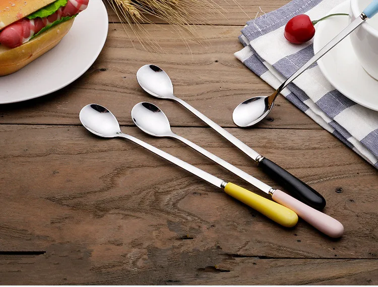 1PC Stainless Coffee Spoon Steel Long Ceramic Handle Iced Tea Spoon Cold Drink Fruit Juice Long Mixing Spoon PI 006
1PC Stainless Coffee Spoon Steel Long Ceramic Handle Iced Tea Spoon Cold Drink Fruit Juice Long Mixing Spoon PI 006