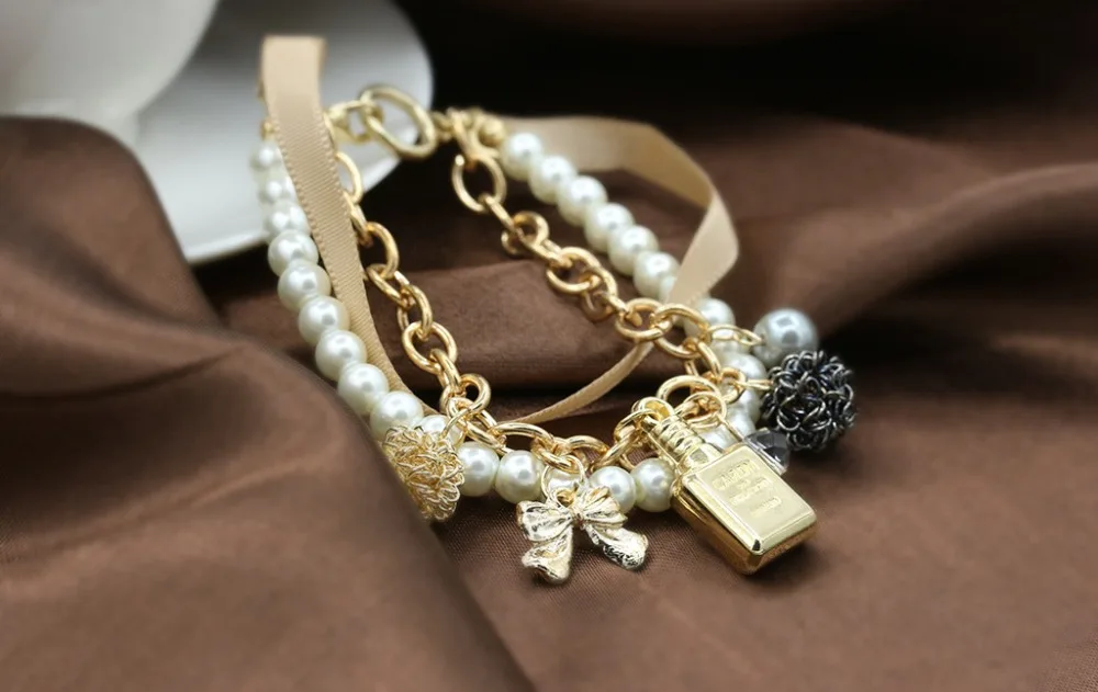New girl perfume bottle decorative bracelet pearl ribbon bow crystal bracelet wholesale
New girl perfume bottle decorative bracelet pearl ribbon bow crystal bracelet wholesale