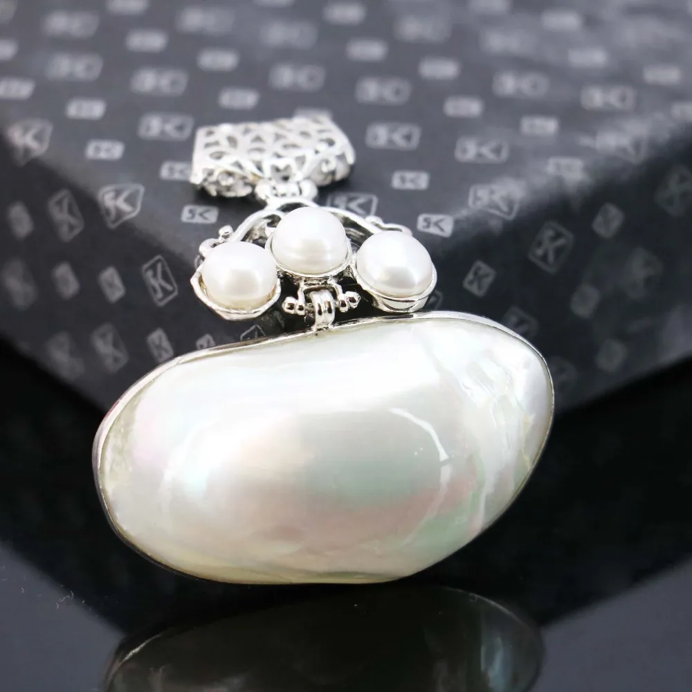 L009 New marine natural white shell abalone shell pearl pendant,Fit fashion female necklace DIY making wholesale
L009 New marine natural white shell abalone shell pearl pendant,Fit fashion female necklace DIY making wholesale