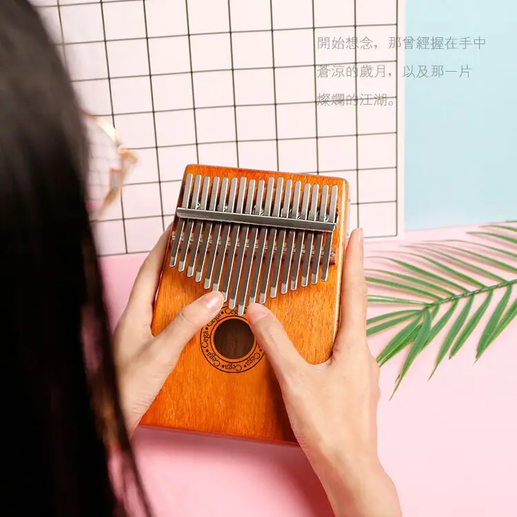 Kalimba Panio 17 Keys Kalimba Thumb Piano High-Quality Wood Mahogany Body Musical Instrument
Kalimba Panio 17 Keys Kalimba Thumb Piano High-Quality Wood Mahogany Body Musical Instrument