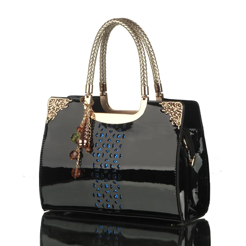 Bag Female 2019 New Patent Leather Hollow Portable Big-name Handbags Bolsos Mujer Shoulder Diagonal Ladies Bag
Bag Female 2019 New Patent Leather Hollow Portable Big-name Handbags Bolsos Mujer Shoulder Diagonal Ladies Bag
