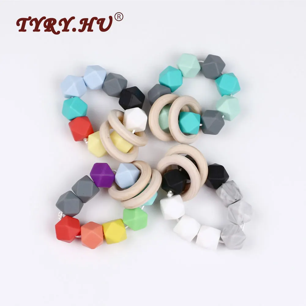 TYRY.HU Baby Silicone Teethers Chewable Bracelet With 17mm Hexagon Silicone Teething Beads + 40mm Wooden Ring Mordedor Silicona
TYRY.HU Baby Silicone Teethers Chewable Bracelet With 17mm Hexagon Silicone Teething Beads + 40mm Wooden Ring Mordedor Silicona