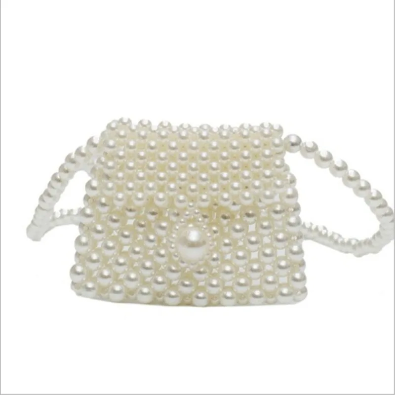 Woven shell pearl bag fashion crossbody purse Handmade beaded bag female 2019 new.
Woven shell pearl bag fashion crossbody purse Handmade beaded bag female 2019 new.