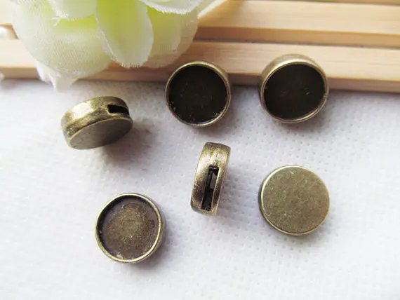 100pcs Antique Silver/Antique Bronze Round Bracelet and Necklace Slider Beads,Base Setting Tray Bezel,For 12mm Cabochon/Cameo
100pcs Antique Silver/Antique Bronze Round Bracelet and Necklace Slider Beads,Base Setting Tray Bezel,For 12mm Cabochon/Cameo