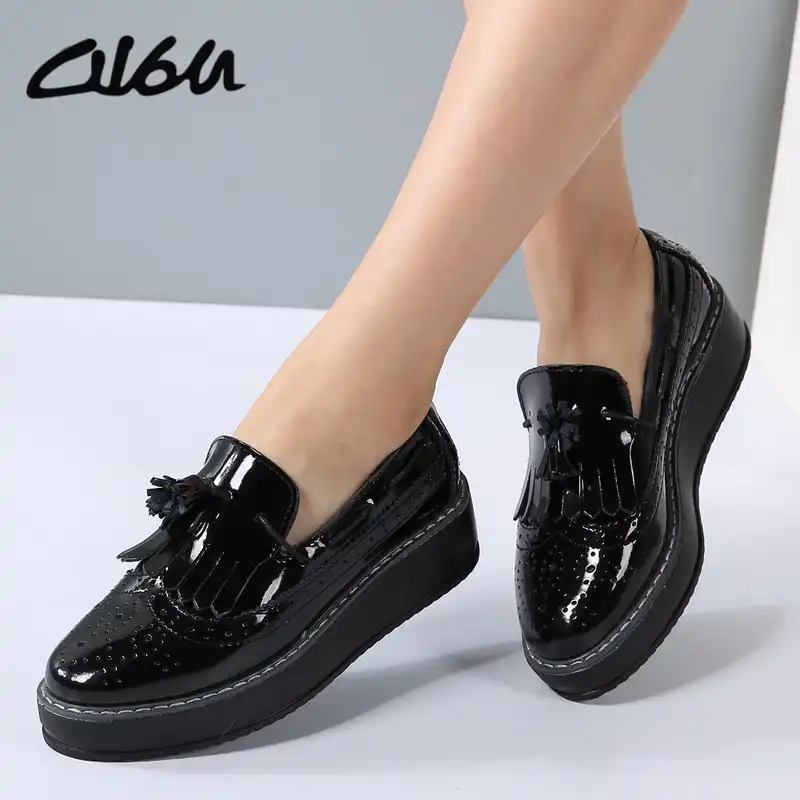 black leather platform slip ons