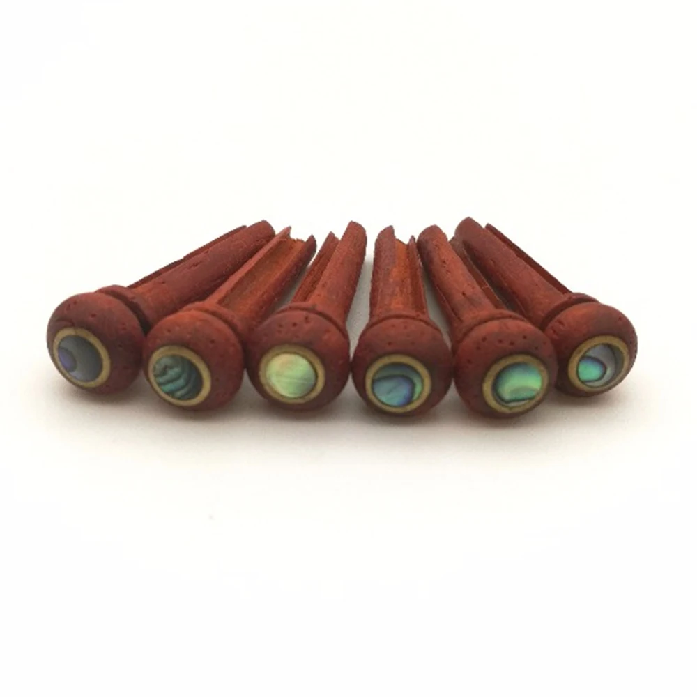 6Pcs/set Cocobolo wood Acoustic Guitar Bridge Pins Abalone Dot And Brass Circle Durable Guitar String Nails Accessories
6Pcs/set Cocobolo wood Acoustic Guitar Bridge Pins Abalone Dot And Brass Circle Durable Guitar String Nails Accessories