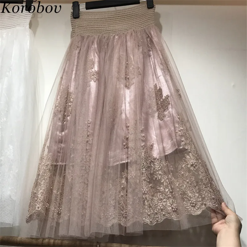 Korobov 2019 Spring Summer New Flower Embroidery Skirts A-Line High Waist Mesh Perspective Pearls Skirt Preppy Style 76879
Korobov 2019 Spring Summer New Flower Embroidery Skirts A-Line High Waist Mesh Perspective Pearls Skirt Preppy Style 76879