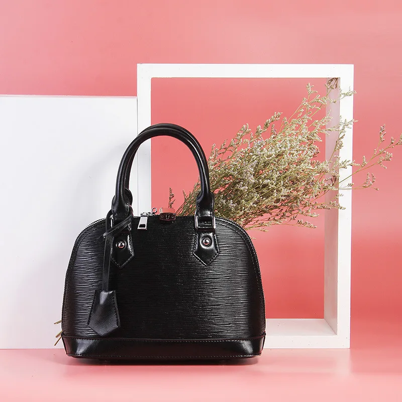 2019 New Cowhide Female Entrapment Signature Shell cow Leather Female Packets Shoulder Hand Strap Bag
2019 New Cowhide Female Entrapment Signature Shell cow Leather Female Packets Shoulder Hand Strap Bag