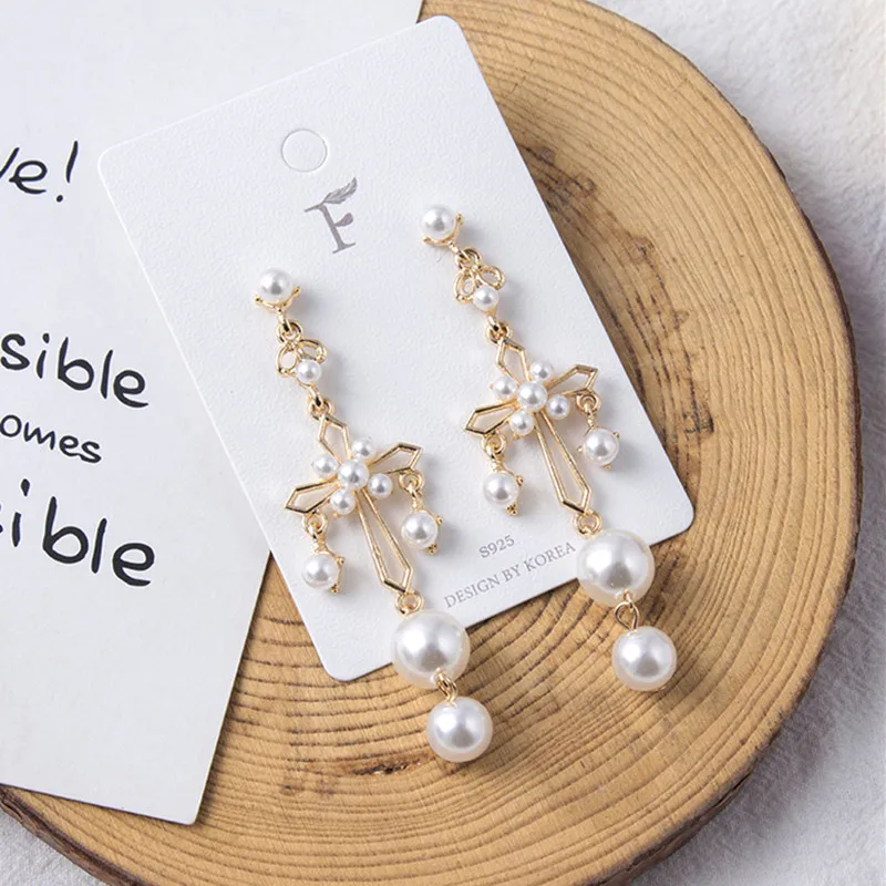New Korean Style Full Simulated Pearl Hollow Cross Dangle Pendientes Temperament Women Party Earrings Fashion Jewelry 6M2029
New Korean Style Full Simulated Pearl Hollow Cross Dangle Pendientes Temperament Women Party Earrings Fashion Jewelry 6M2029
