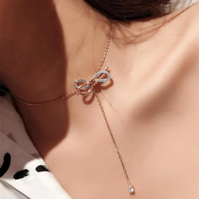 Explosion Models Hot Sale Bow Tassel Necklace Female Gold Short Clavicle Chain Tide Temperament Zircon Pendant Crystal Necklace
Explosion Models Hot Sale Bow Tassel Necklace Female Gold Short Clavicle Chain Tide Temperament Zircon Pendant Crystal Necklace