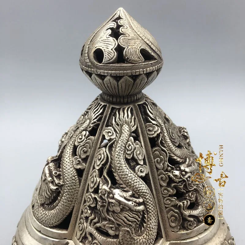 China's rare miao silver Kowloon incense burner statue family living room home decoration metal crafts
China's rare miao silver Kowloon incense burner statue family living room home decoration metal crafts