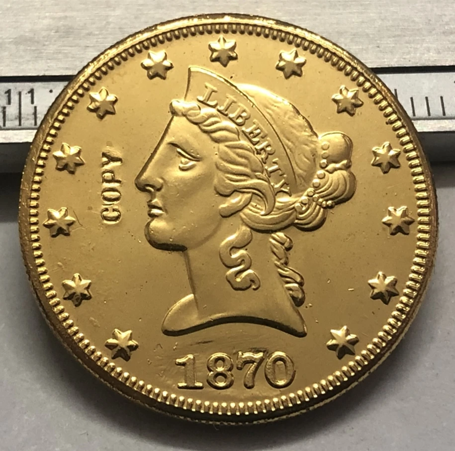 1870 United States Liberty Head (Motto on Reverse) $10 Gold Copy Coin (Choose any one mint P & S & O)
1870 United States Liberty Head (Motto on Reverse) $10 Gold Copy Coin (Choose any one mint P & S & O)
