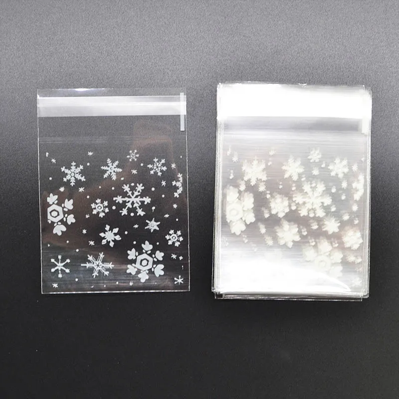 50Pcs 100Pcs White Snowflake Plastic Gift Bag Transparent Cellophane Baking Candy Cookie Bag For Wedding Christmas Party Supply
50Pcs 100Pcs White Snowflake Plastic Gift Bag Transparent Cellophane Baking Candy Cookie Bag For Wedding Christmas Party Supply
