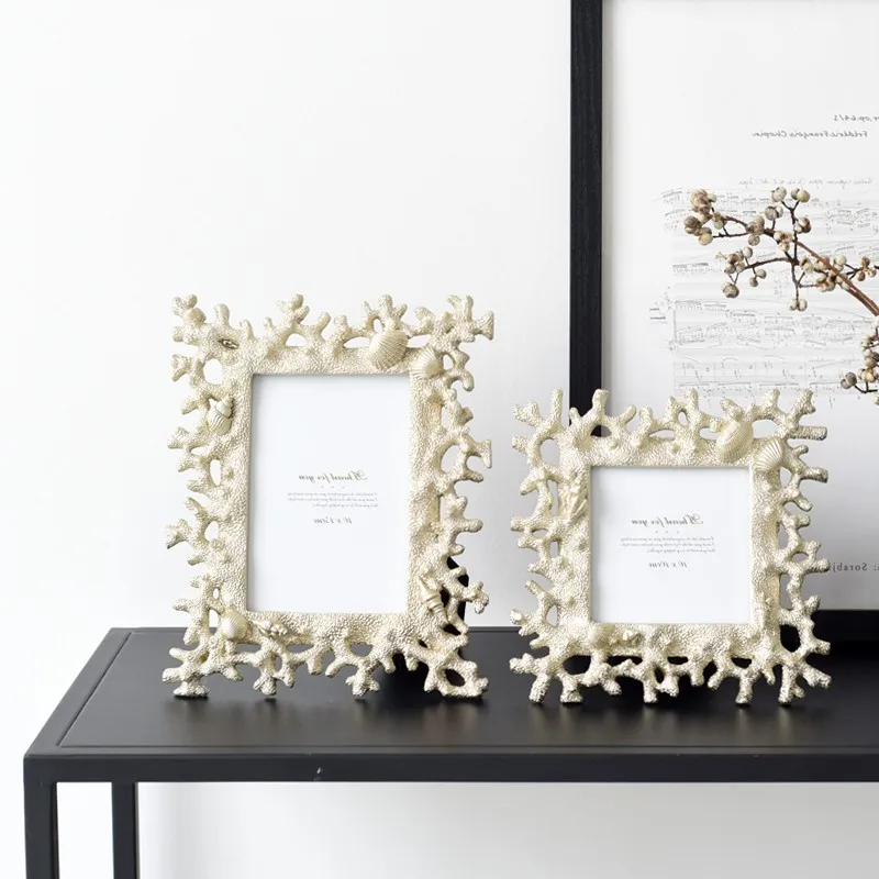 Mediterranean Style Photo Frame Creative Coral Shell Conch Resin Multifunctional Picture Certificate Frame Desktop Decoration
Mediterranean Style Photo Frame Creative Coral Shell Conch Resin Multifunctional Picture Certificate Frame Desktop Decoration