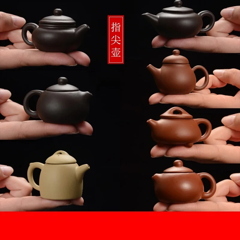 Mini purple clay pot creative mini pocket fingertip pot trumpet tea playing tea pet ornaments kung fu tea set mainten
Mini purple clay pot creative mini pocket fingertip pot trumpet tea playing tea pet ornaments kung fu tea set mainten