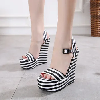 Summer ladies waterproof platform with wedge sandals striped transparent buckle with comfortable high heels.
Summer ladies waterproof platform with wedge sandals striped transparent buckle with comfortable high heels.