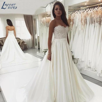 ZL1008 New Gorgeous Strapless A-Line Satin Lace Wedding Dresses Bridal Gowns Plus Size Celebrity vestido De Noiva robe de mariee
ZL1008 New Gorgeous Strapless A-Line Satin Lace Wedding Dresses Bridal Gowns Plus Size Celebrity vestido De Noiva robe de mariee