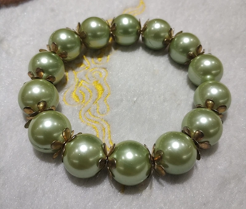 Elegant bracelet vivid green seashell pearl 12-13mm Round Pearl Bracelet 7.5" special color and charming jewelry women
Elegant bracelet vivid green seashell pearl 12-13mm Round Pearl Bracelet 7.5" special color and charming jewelry women