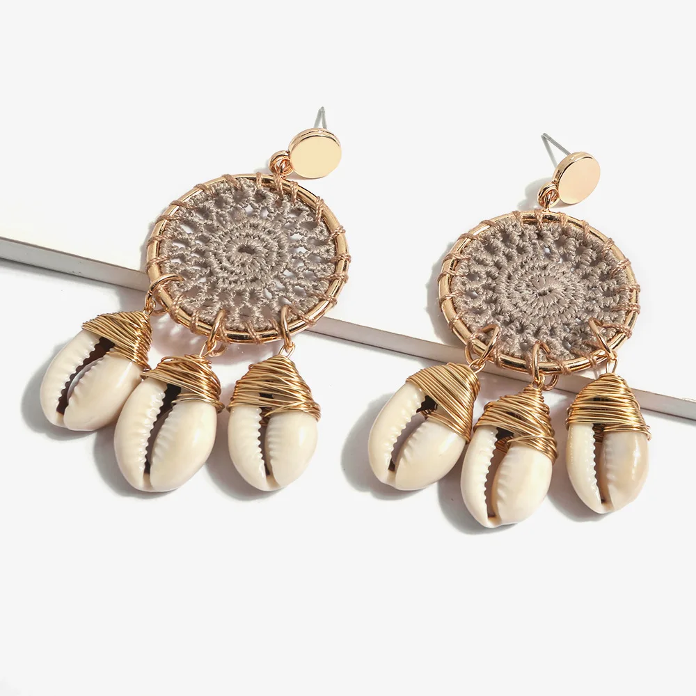 8Seasons New Bohemian Shell Handmade Round Dreamcatcher Hollow Out Drop Earrings For Women Party Straw Earrings Beach Jewelry
8Seasons New Bohemian Shell Handmade Round Dreamcatcher Hollow Out Drop Earrings For Women Party Straw Earrings Beach Jewelry