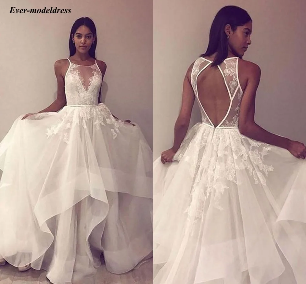 2019 Wedding Dress Beach Sexy Open Back A-Line Charming Bridal Gowns Lace Appliques Sweep Train Sheer Neck Robe De Mariee
2019 Wedding Dress Beach Sexy Open Back A-Line Charming Bridal Gowns Lace Appliques Sweep Train Sheer Neck Robe De Mariee