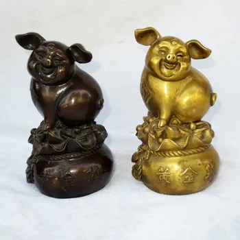A Feng Shui lucky pig pig bronze copper copper pig on the bag of gold lucky Home Furnishing craft supplies.
A Feng Shui lucky pig pig bronze copper copper pig on the bag of gold lucky Home Furnishing craft supplies.