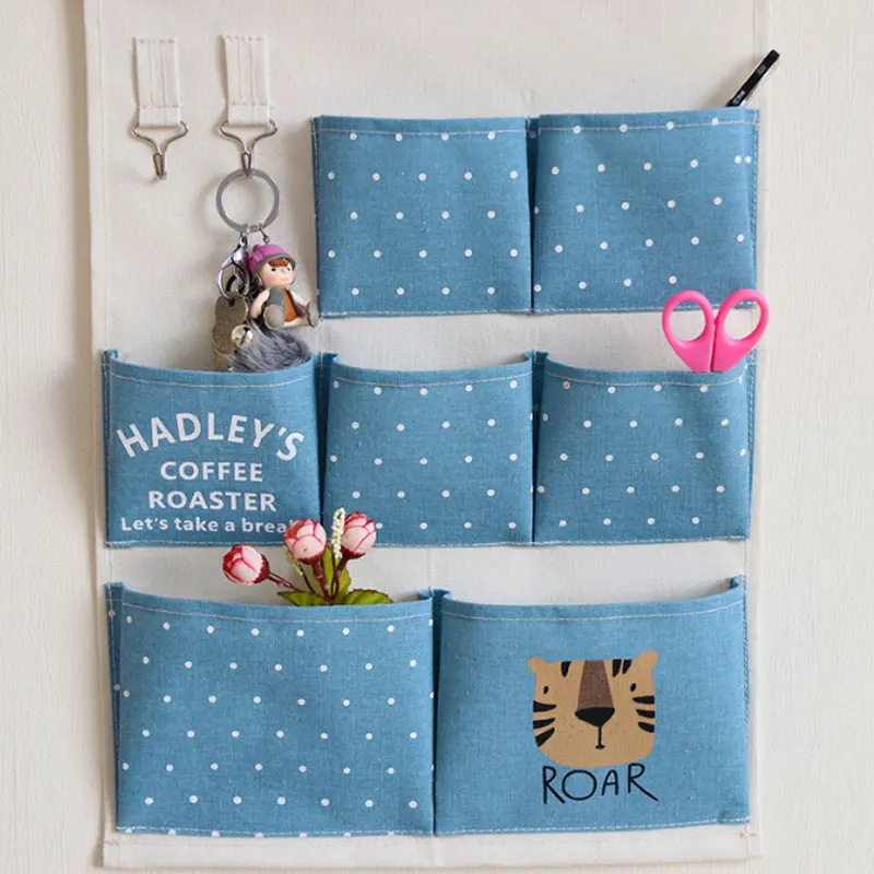 DINIWELL 7 Pockets Hanging Storage Bag With 2 Hooks Door Wall Organizer For Keys Sundries Multi-purpose Cotton And Linen Storage
DINIWELL 7 Pockets Hanging Storage Bag With 2 Hooks Door Wall Organizer For Keys Sundries Multi-purpose Cotton And Linen Storage