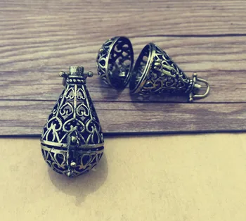 4pcs/lot Antique bronze hollow out water drop (copper) box charm pendant 24mmx42mm
4pcs/lot Antique bronze hollow out water drop (copper) box charm pendant 24mmx42mm