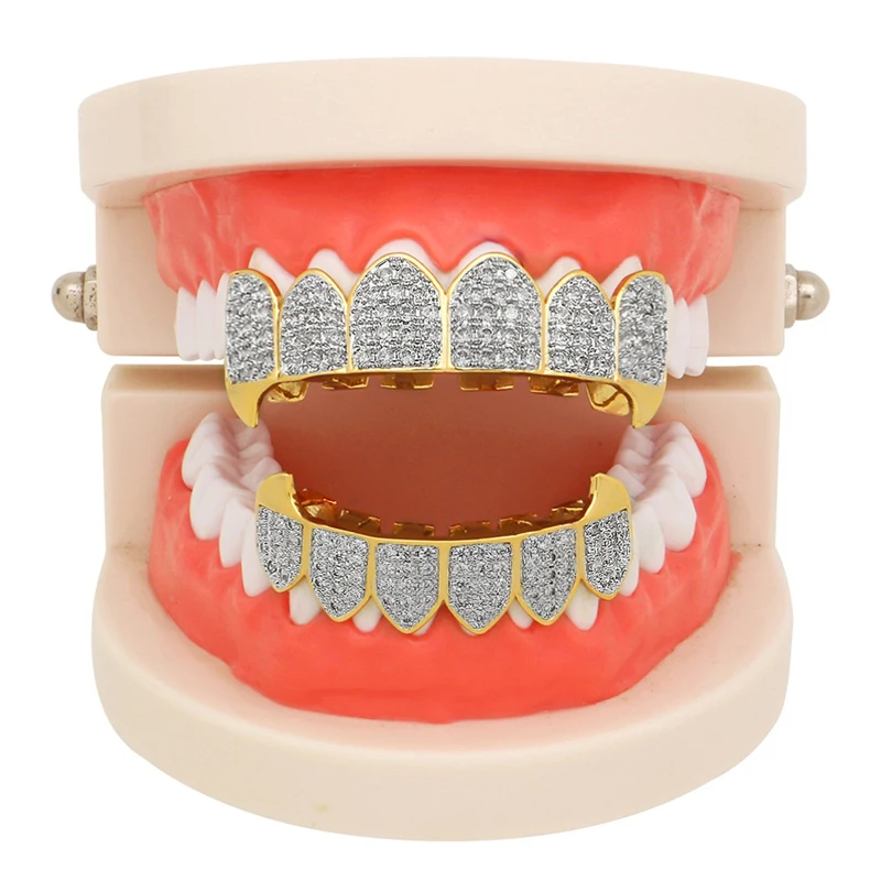 Hip Hop GRILLs Iced Out AAA Zircon Fang Mouth Teeth Grills Caps Top & Bottom Grill Set Men Women Grills Fashion Jewelry
Hip Hop GRILLs Iced Out AAA Zircon Fang Mouth Teeth Grills Caps Top & Bottom Grill Set Men Women Grills Fashion Jewelry