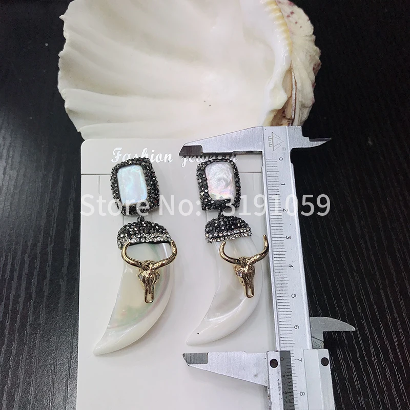 European and American personality fashion pearl shell jewelry earrings vintage style joker accessories earrings
European and American personality fashion pearl shell jewelry earrings vintage style joker accessories earrings