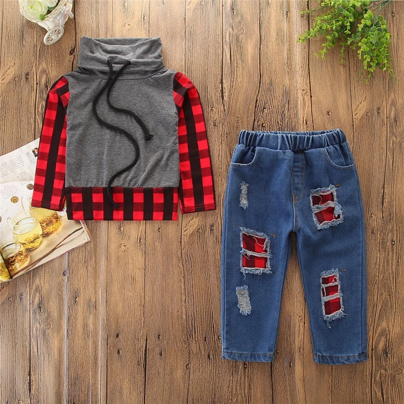 Autumn boy stitching long-sleeved plaid shirt + denim trousers two-piece suits children's clothing Sets
Autumn boy stitching long-sleeved plaid shirt + denim trousers two-piece suits children's clothing Sets