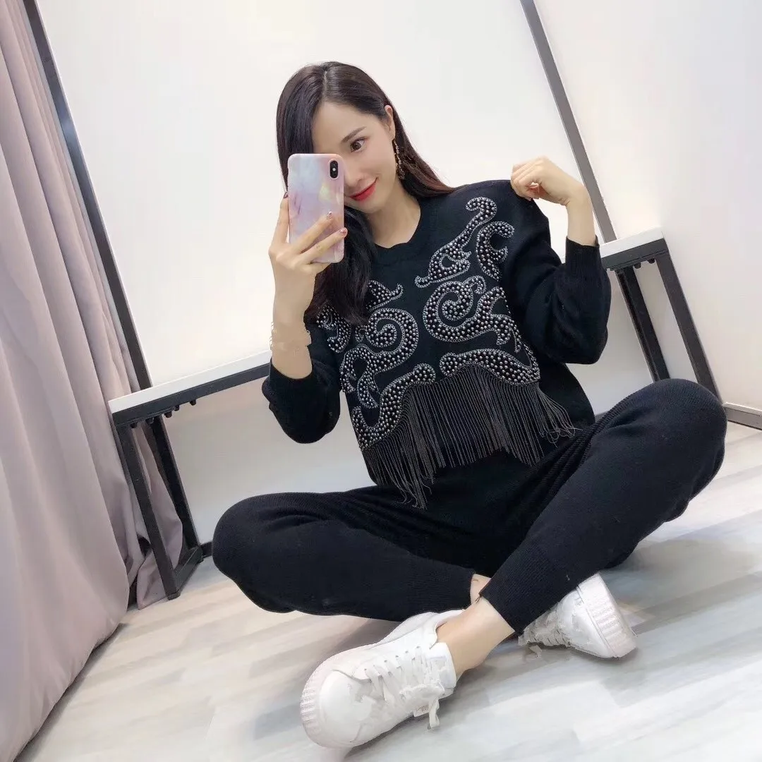 Loose Casual 2 Piece Set Solid Women Sweatsuits And Pant Beading Tassel Tracksuit Fashion Knitted Suits Clothing
Loose Casual 2 Piece Set Solid Women Sweatsuits And Pant Beading Tassel Tracksuit Fashion Knitted Suits Clothing