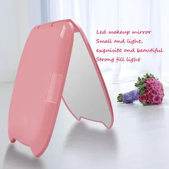 Mini cute cartoon led makeup mirror with light led fill light folding mirror 2 times magnification light makeup mirror
Mini cute cartoon led makeup mirror with light led fill light folding mirror 2 times magnification light makeup mirror