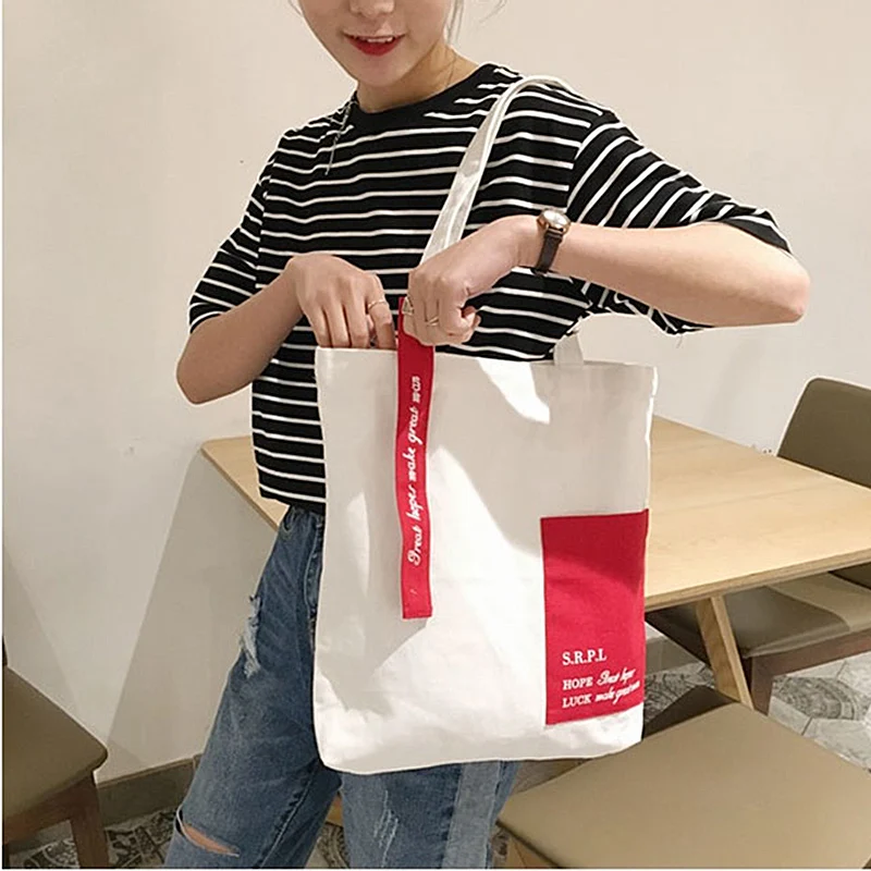 Canvas Shopping Bag Portable Large Capacity Handbag Ladies Shoulder Outside the pocket Fashion Letter Handbag
Canvas Shopping Bag Portable Large Capacity Handbag Ladies Shoulder Outside the pocket Fashion Letter Handbag