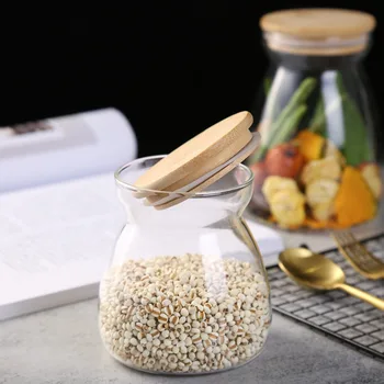 Transparent Creative Glass Storage Bottle Kitchen Organizer Simple Design Glass Bottle for Tea Grain Coffe Beans with Cover
Transparent Creative Glass Storage Bottle Kitchen Organizer Simple Design Glass Bottle for Tea Grain Coffe Beans with Cover