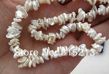 ddh001265 White Cornflake Keshi Keishi Freshwater Pearl Necklace 14KGP 17
ddh001265 White Cornflake Keshi Keishi Freshwater Pearl Necklace 14KGP 17