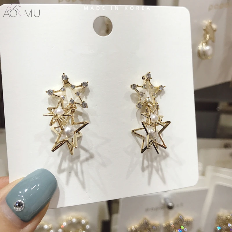 AOMU 2019 South Korean Geometric Double Star Gold Metal Crystal Rhinestone Pearl Stud Earrings for Women Party Jewelry
AOMU 2019 South Korean Geometric Double Star Gold Metal Crystal Rhinestone Pearl Stud Earrings for Women Party Jewelry