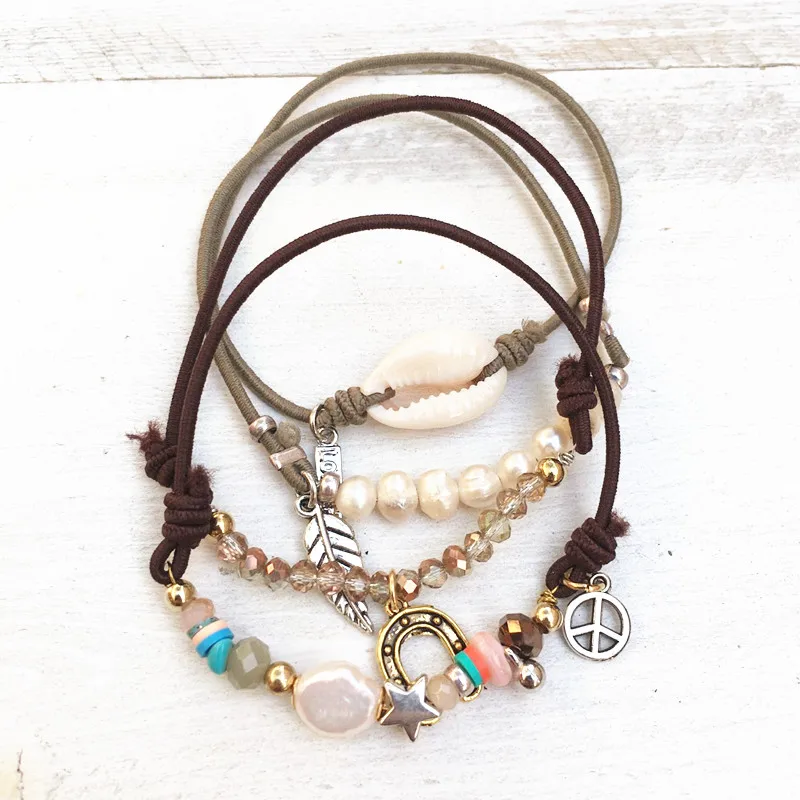 Dongmu jewellery handmade bohemian exaggerated fashion combination beaded elastic crystal ladies bracelet shell tassel
Dongmu jewellery handmade bohemian exaggerated fashion combination beaded elastic crystal ladies bracelet shell tassel