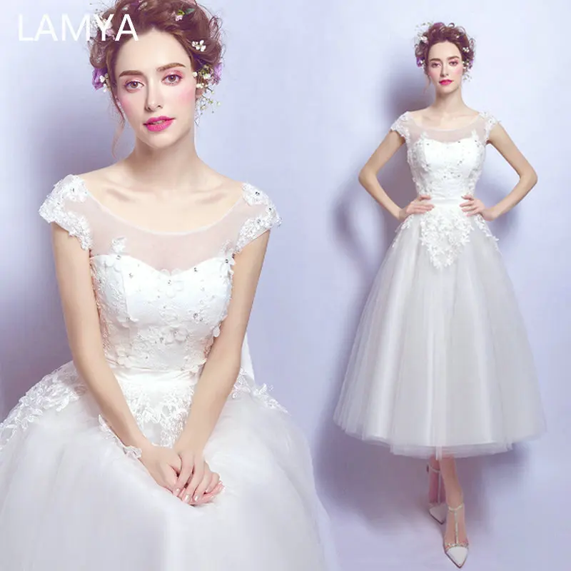 LAMYA Tea Length Cap Sleeve Wedding Dress Appliques With Crystal Bridal Gown Elegant Vestidos de Noivas Plus Size Ball Gowns
LAMYA Tea Length Cap Sleeve Wedding Dress Appliques With Crystal Bridal Gown Elegant Vestidos de Noivas Plus Size Ball Gowns