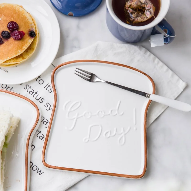 6.5 Inch Ceramic Breakfast Plate Bread Graffiti Border Toast Shape Board Lunch Kitchen Tableware Porcelain Camera Artifact
6.5 Inch Ceramic Breakfast Plate Bread Graffiti Border Toast Shape Board Lunch Kitchen Tableware Porcelain Camera Artifact