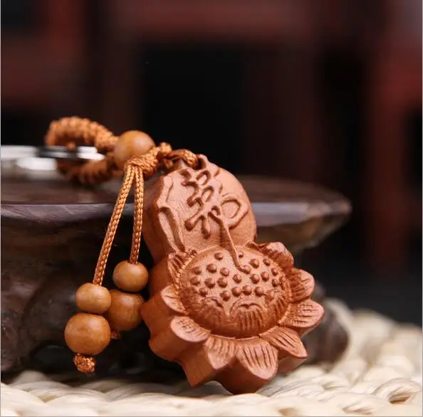 Personality new fashion natural wood lotus Buddha keychain key ring for unisex lucky flower lotus key chains car key bag jewelry
Personality new fashion natural wood lotus Buddha keychain key ring for unisex lucky flower lotus key chains car key bag jewelry
